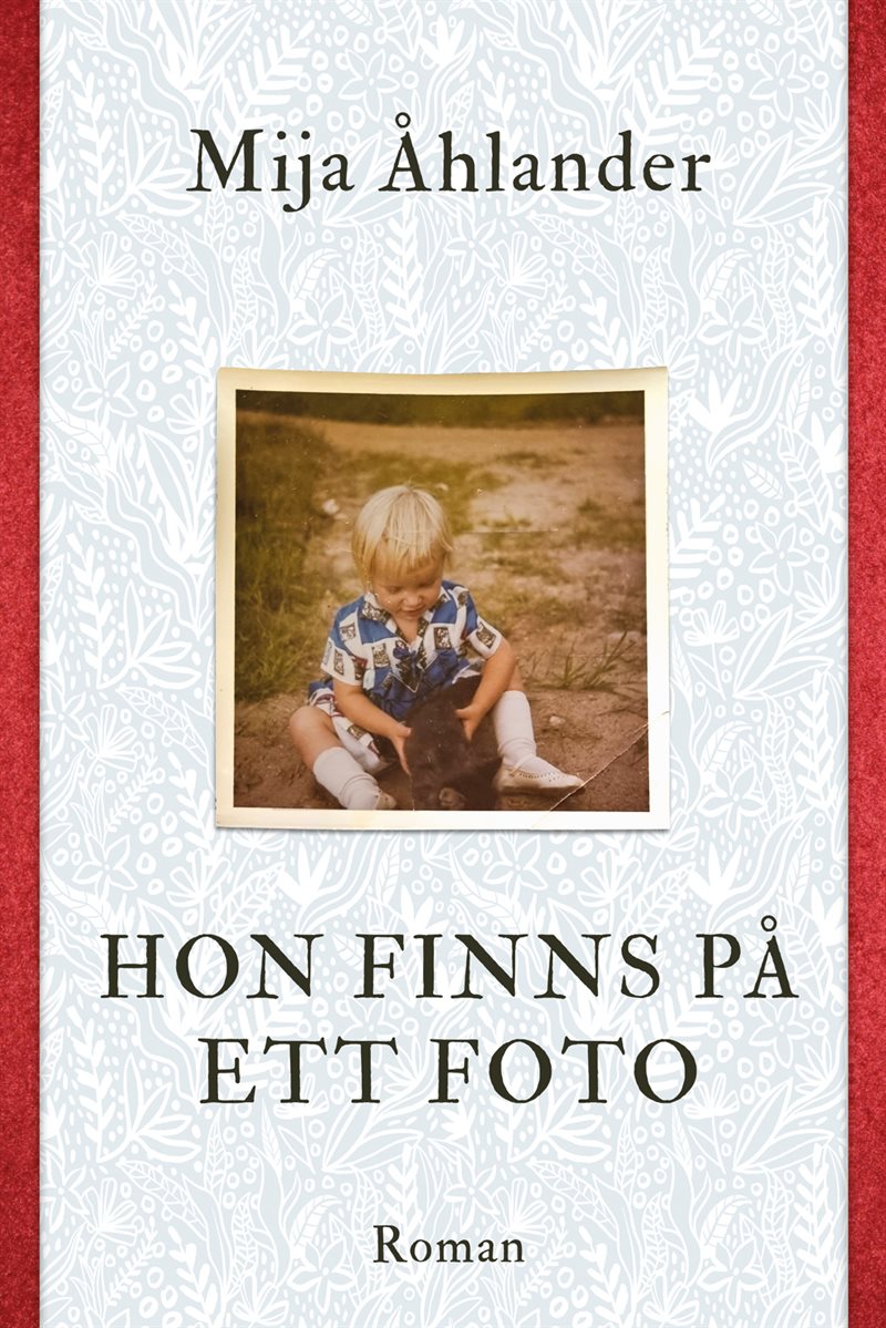 Hon finns på ett foto